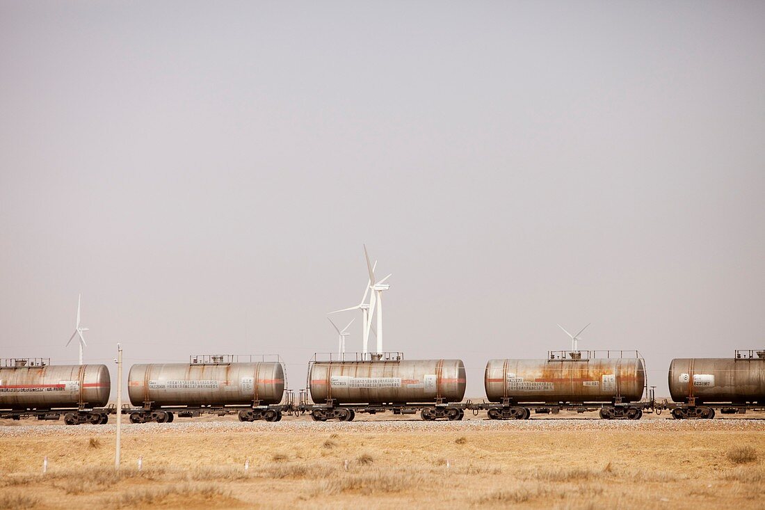 Tanker cars and wind farm,China