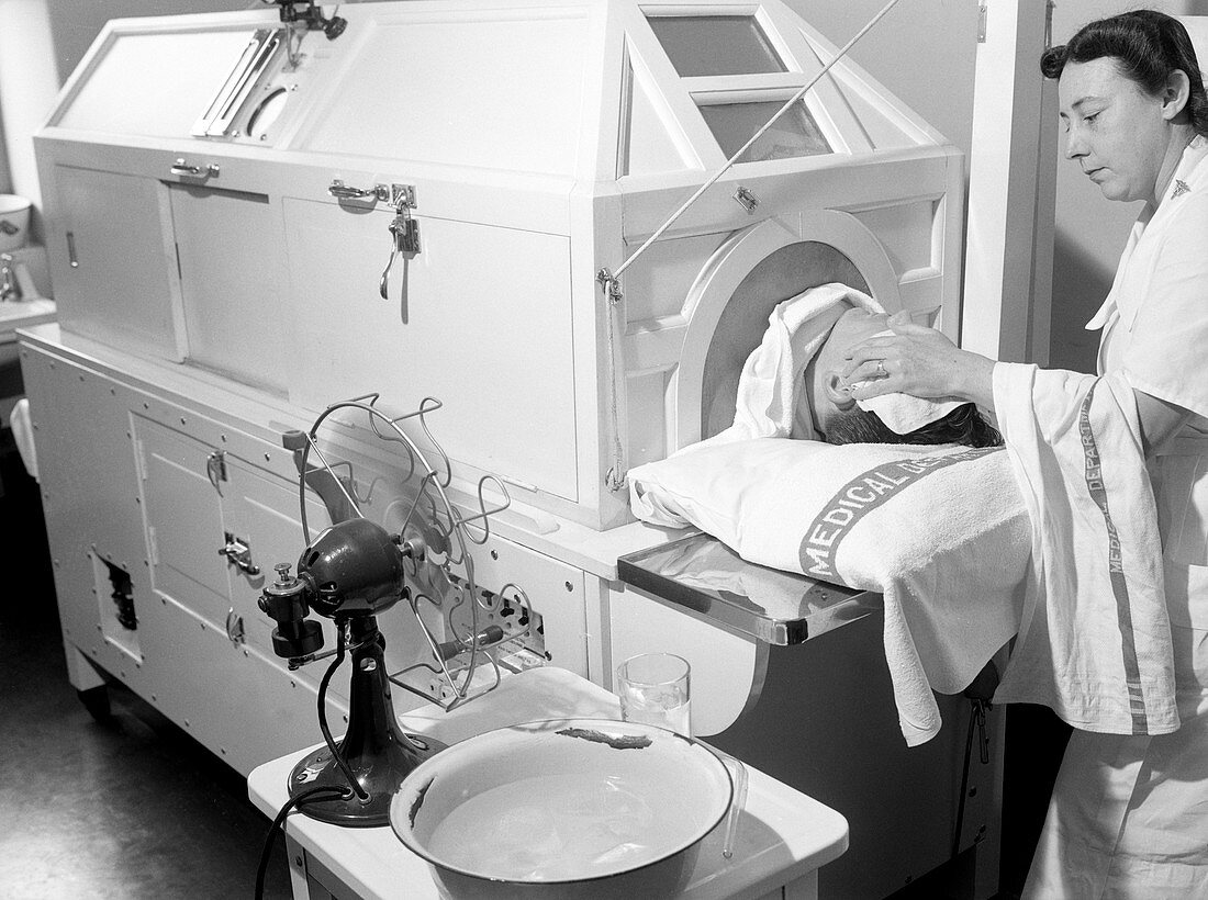Patient in fever machine,1940s