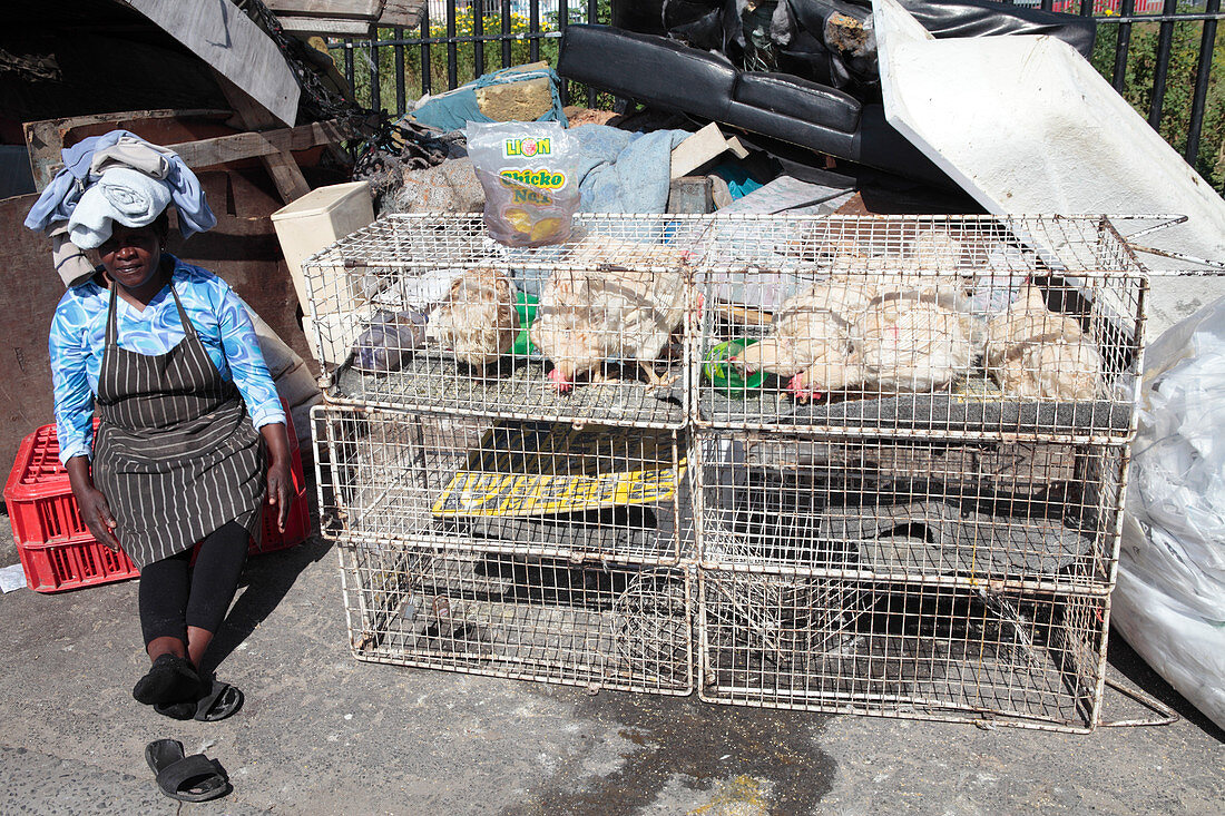 Woman selling chickens