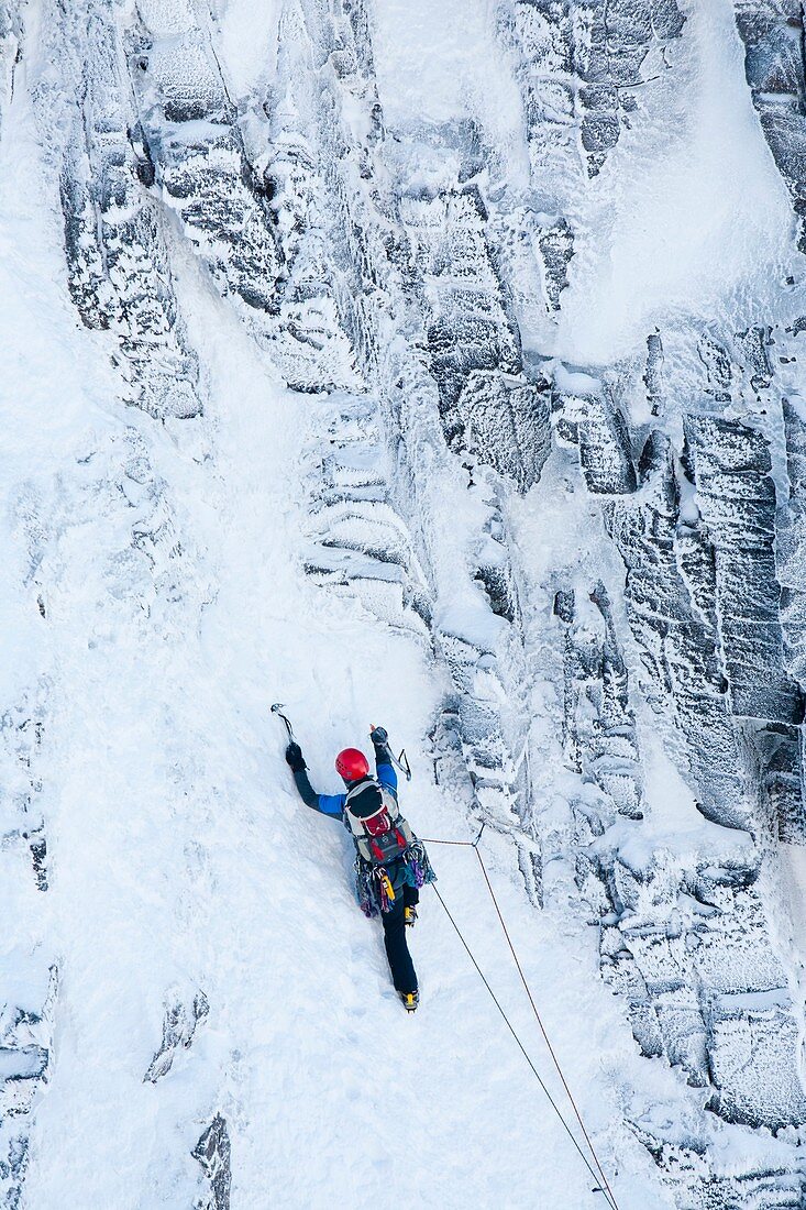 Mountaineer winter climbing