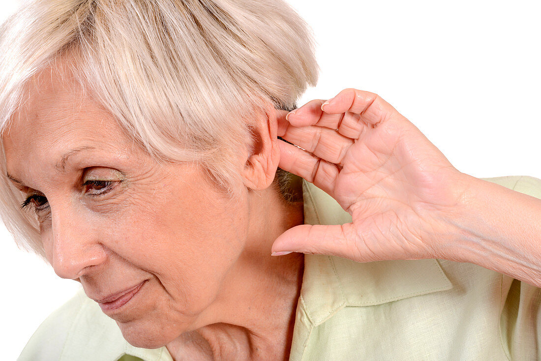 Elderly woman with hearing loss