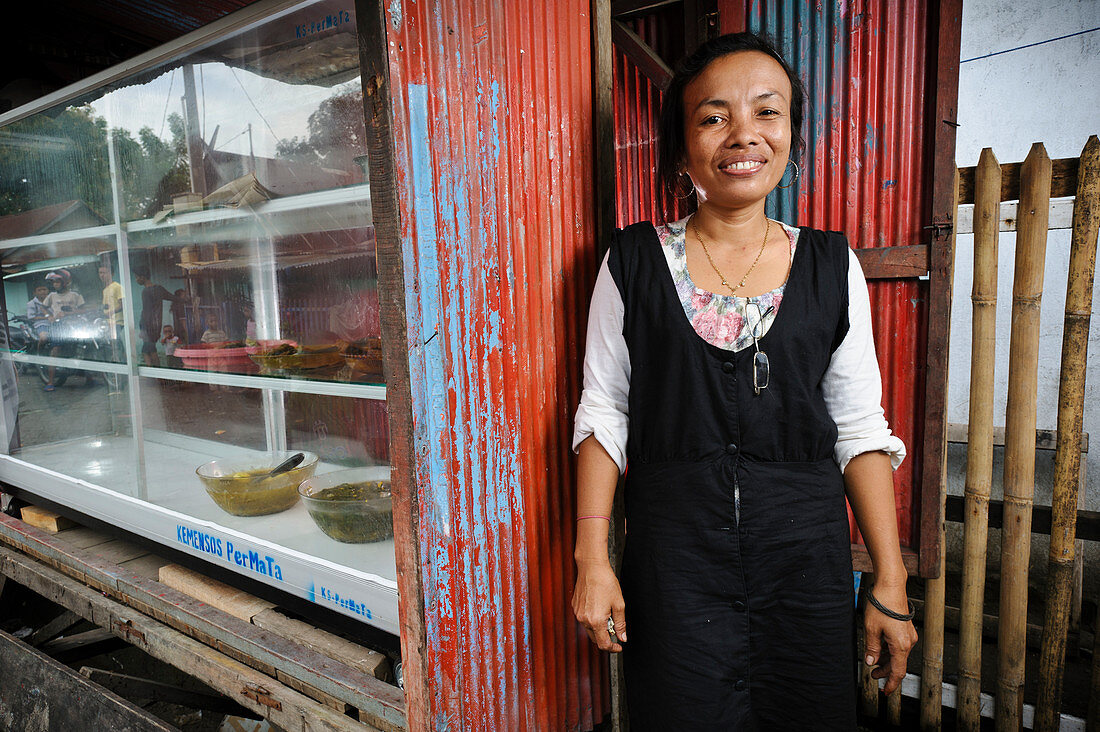 Shopkeeper with leprosy,Indonesia