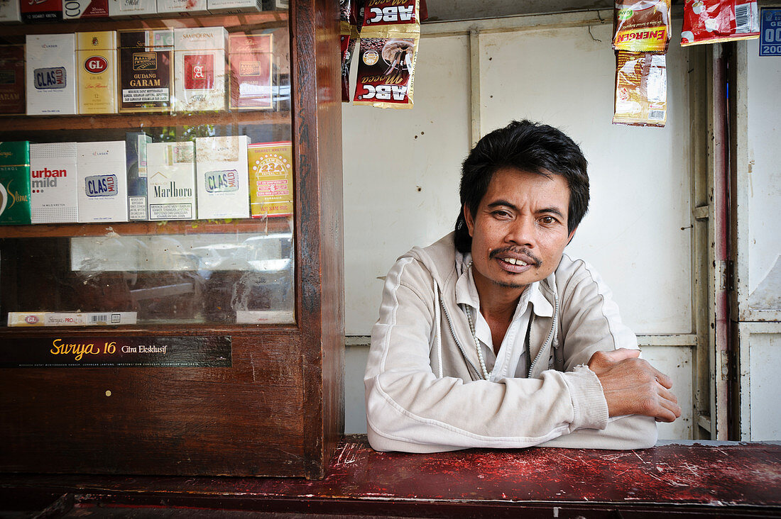 Shopkeeper with leprosy,Indonesia