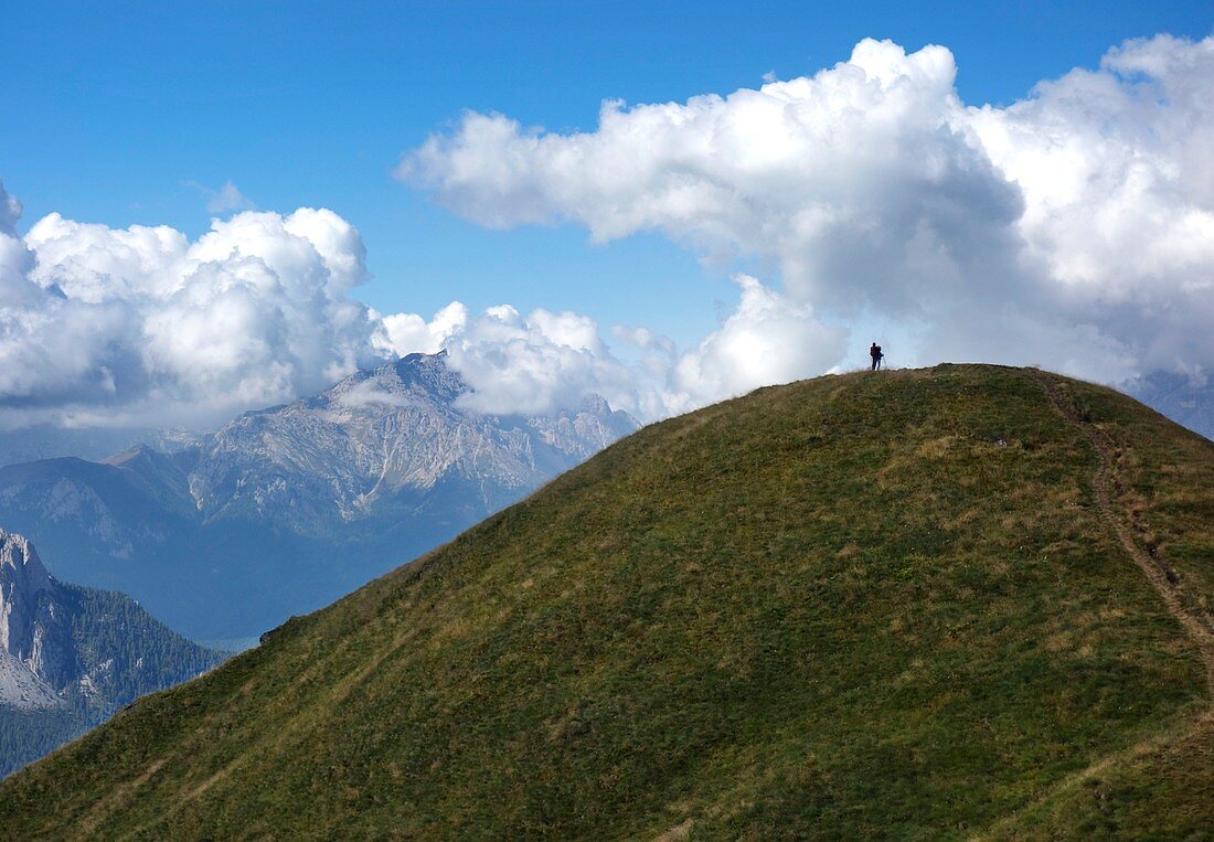 Couple on hilltop in the Dolomites,Itlay