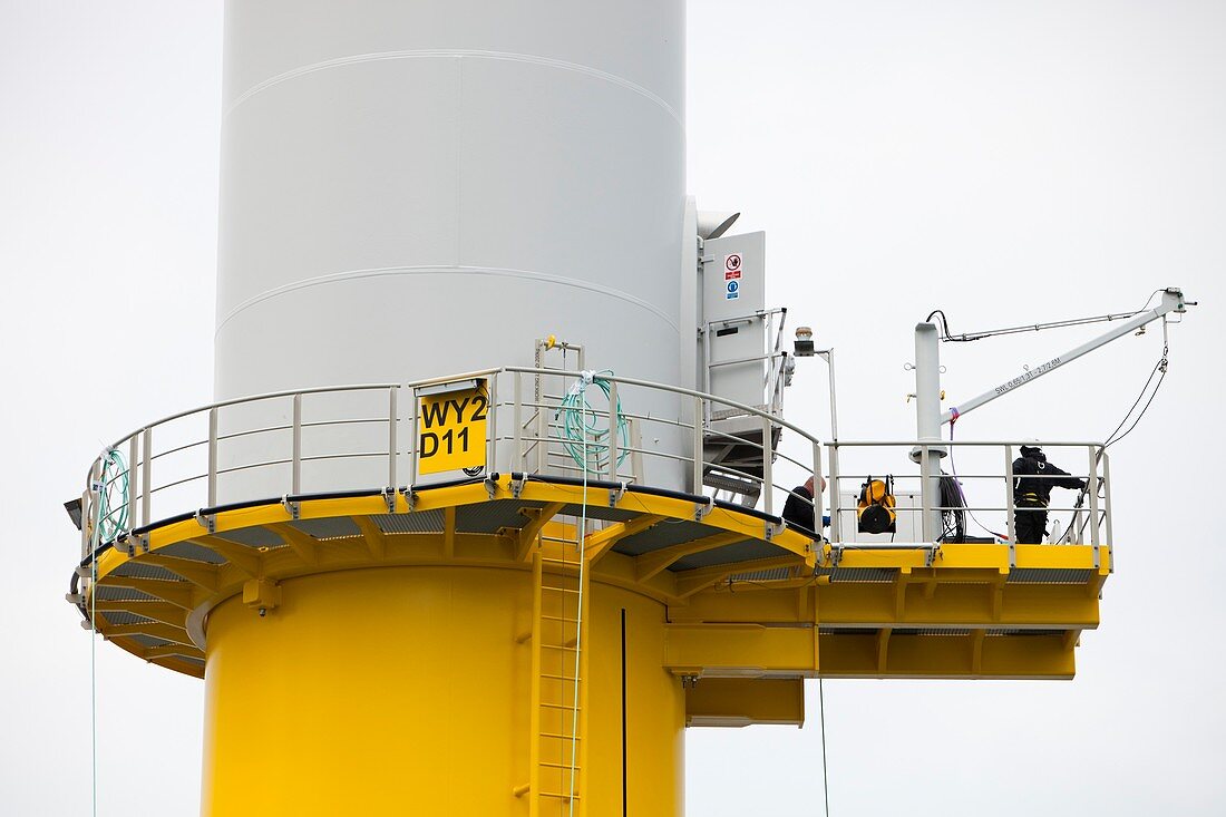 Workers working on a wind turbine