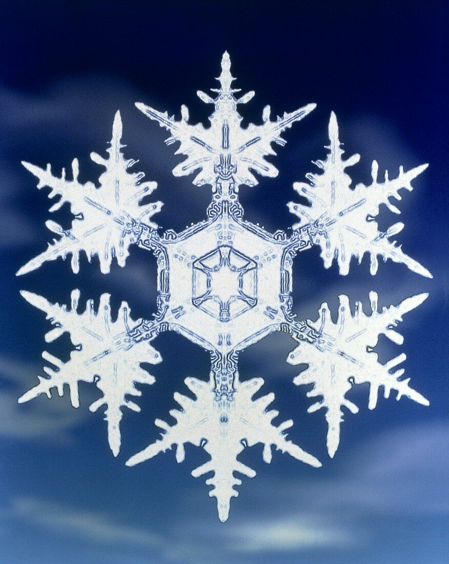 Computer-enhanced image of snowflake on c