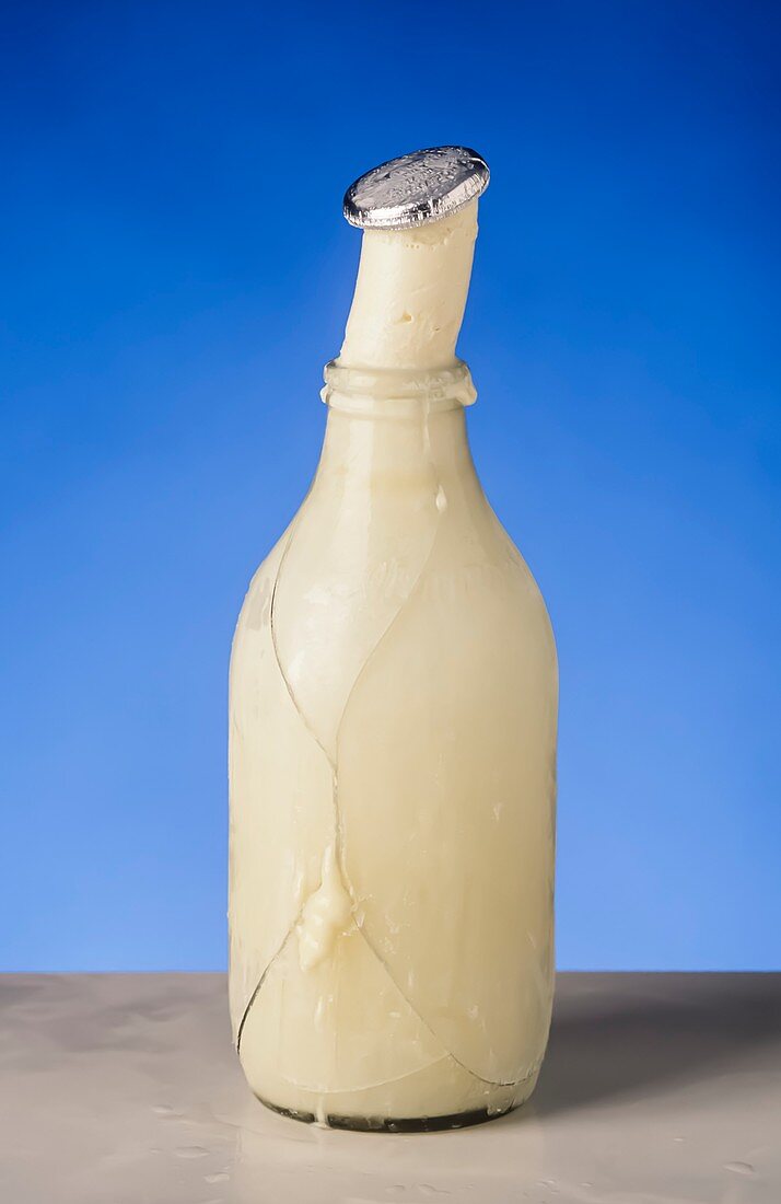 Frozen bottle of milk