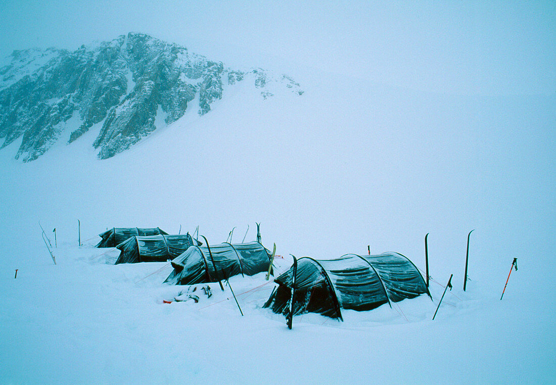 Blizzard in valley with camp,Greenland