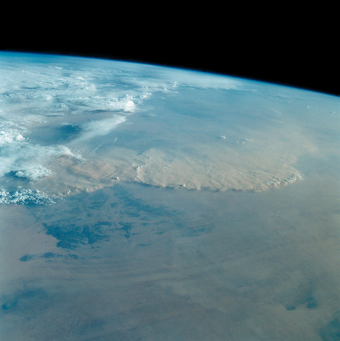 Dust storm over Sahara desert from Space Shuttle