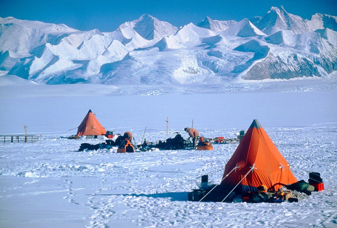 Skidoo maintenance,Antarctica,mountains