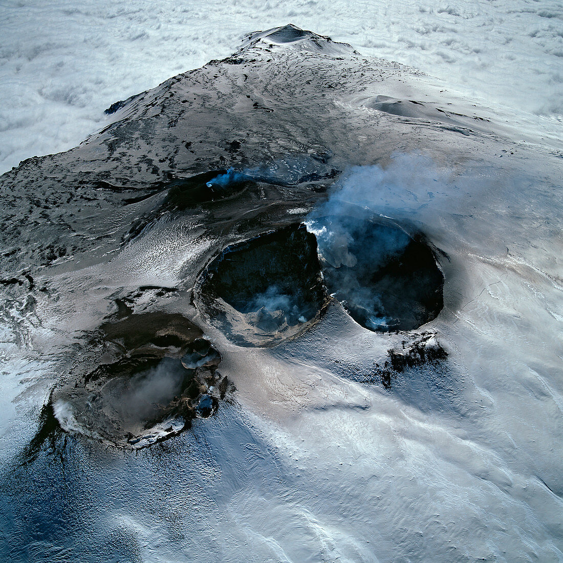 Aerial view of Mount Etna's four main craters