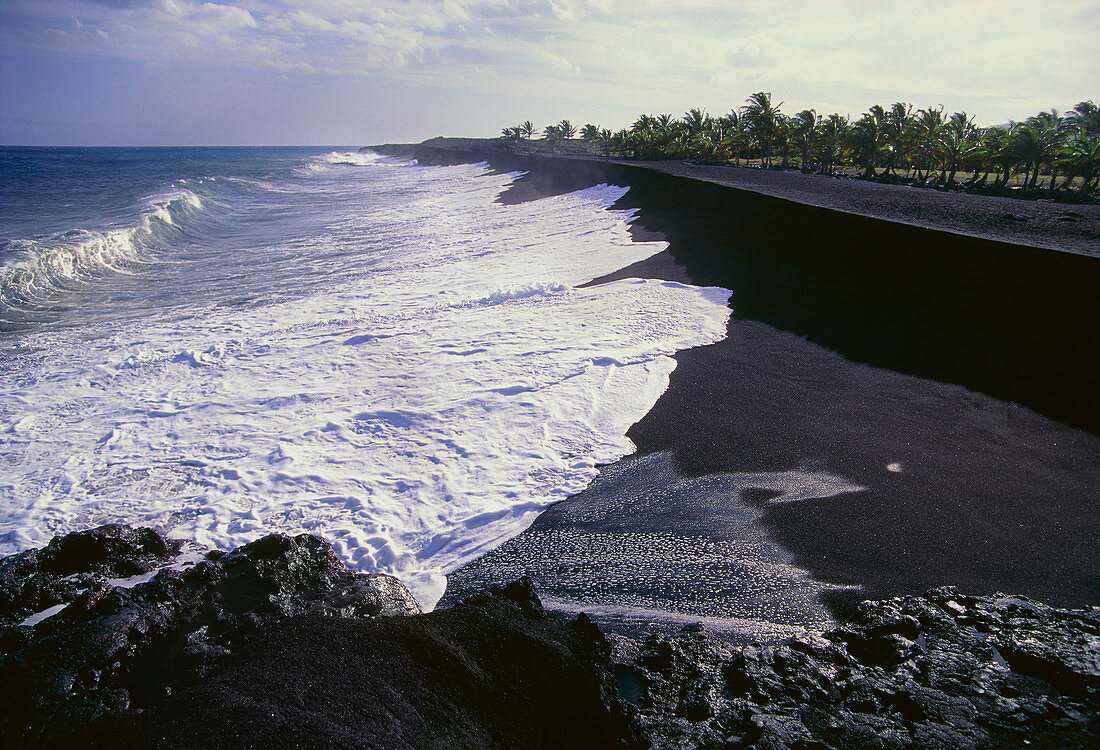 Black sand beach from lava fragments