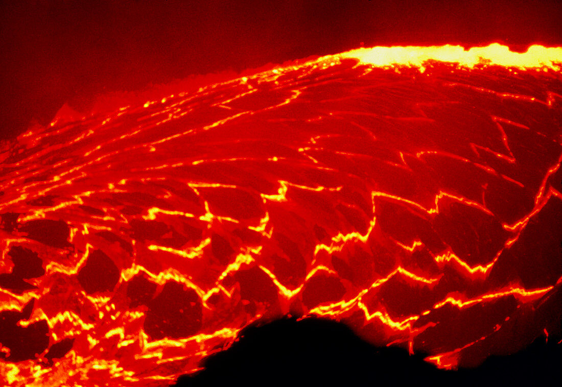Lava lake covered with sections of cooled rock