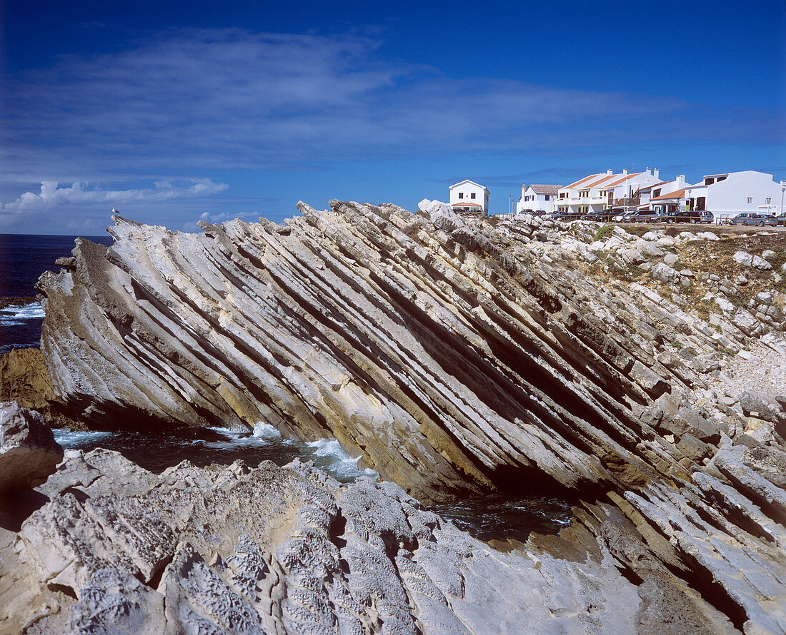 Inclined rock strata at the coast