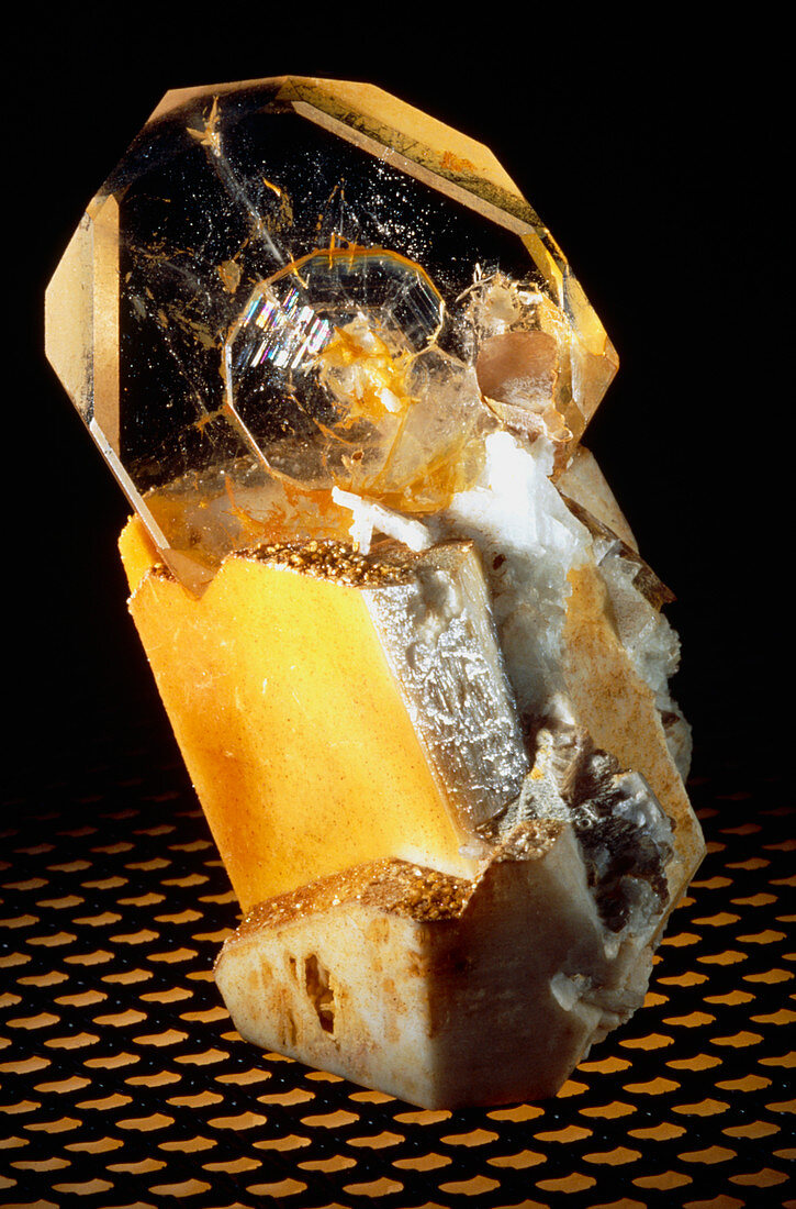 Goshenite crystal embedded in orthoclase