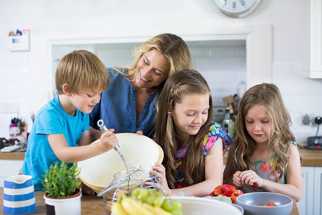 Mother and children in the kitchen