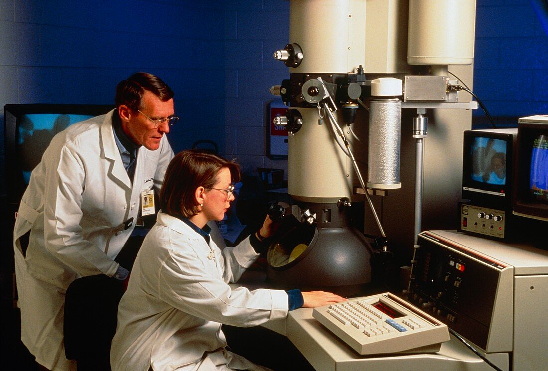 Scientist working with TEM equipment