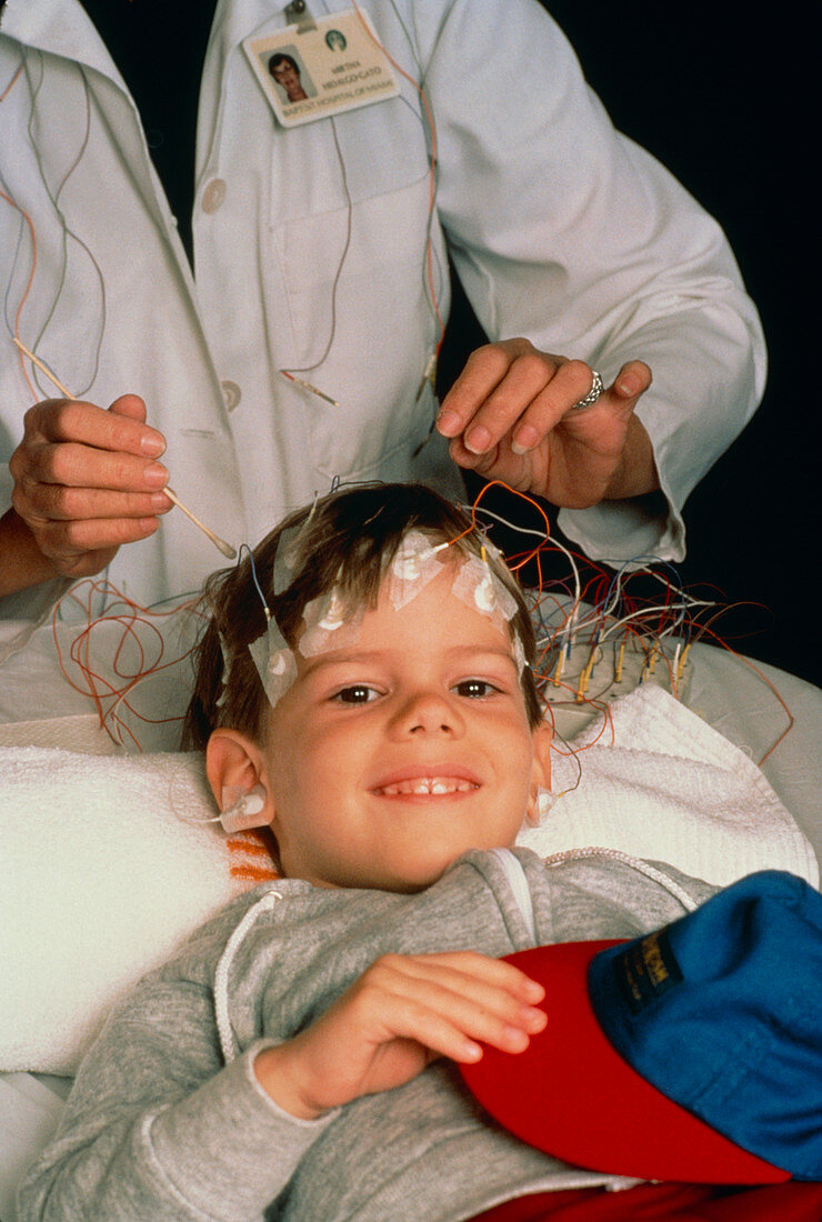 Young boy about to undergo an EEG examination