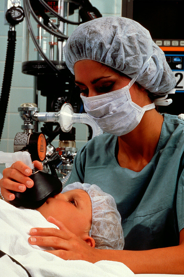 Young child receiving anaesthesia before surgery