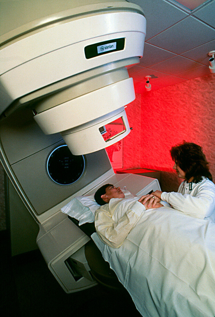 Woman having radiotherapy treatment for cancer