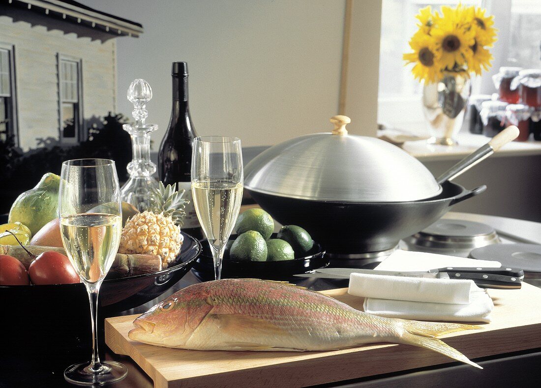 Red Snapper in Kitchen with Champagne and Fruit