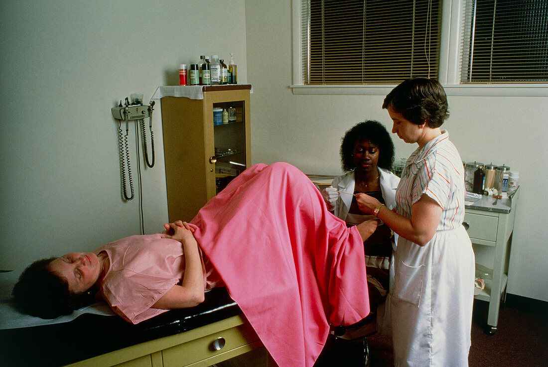 Doctor taking cervical smear