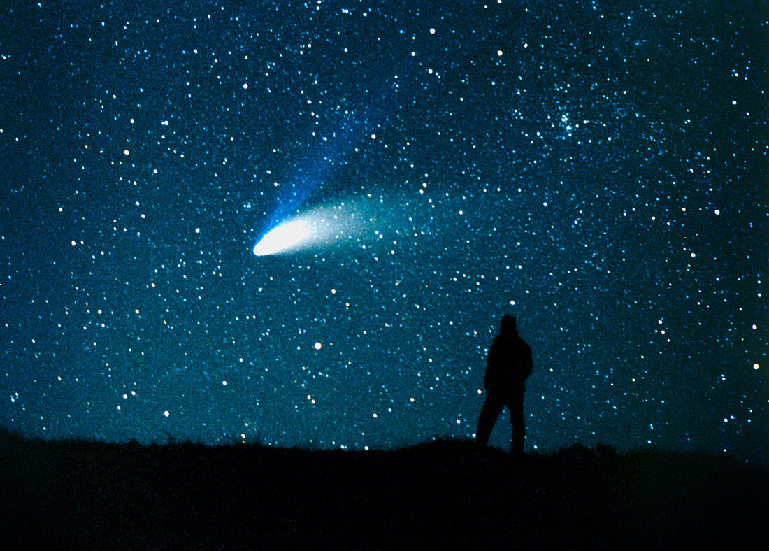 Silhouette of man watching comet Hale-Bopp