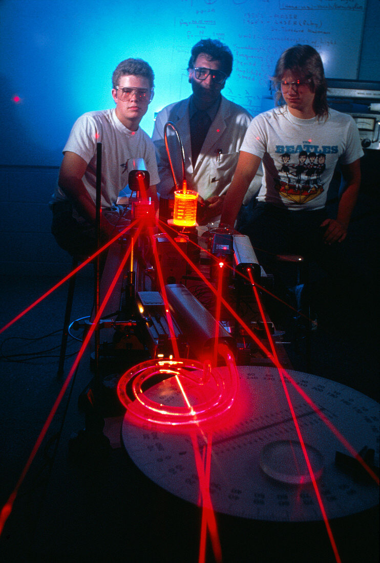 Tech school students work with ruby lasers