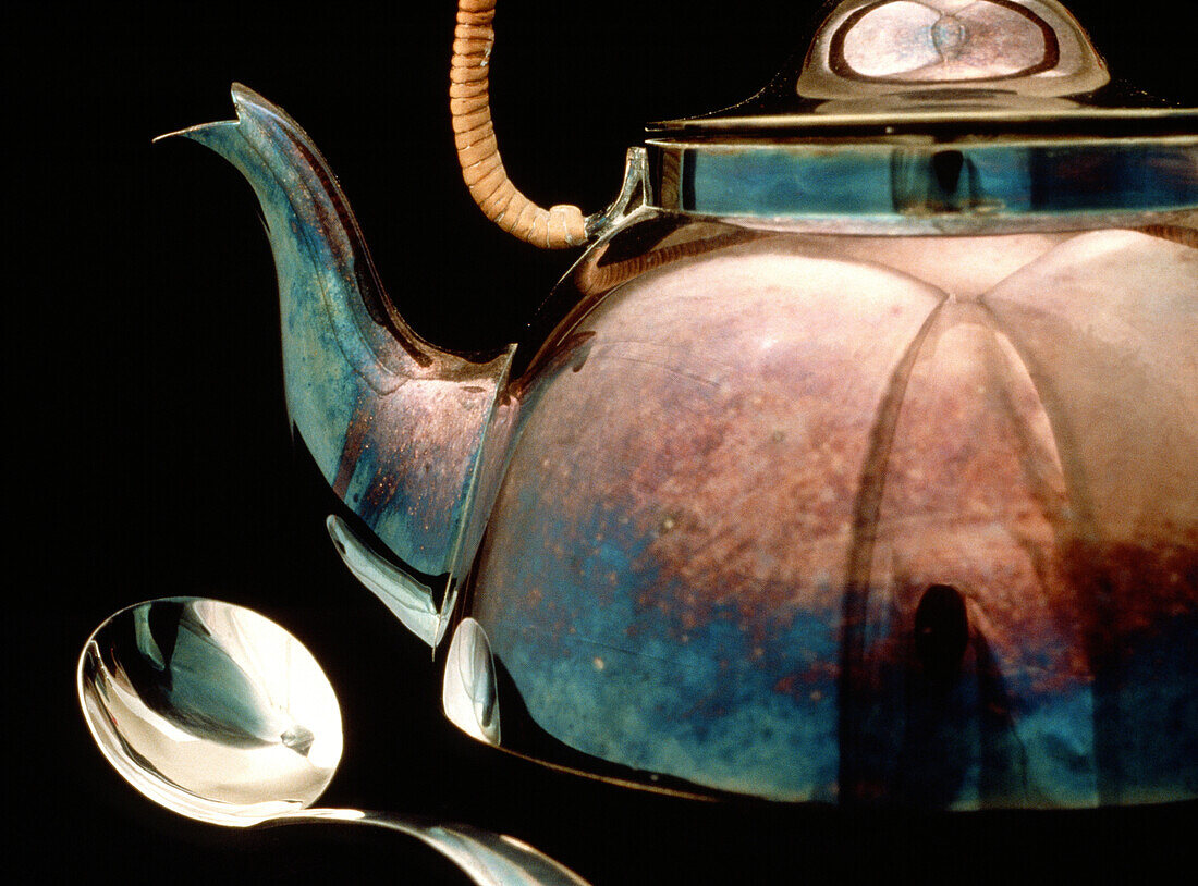 Tarnished silver kettle
