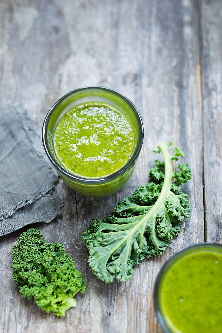 Curly kale smoothies in glasses