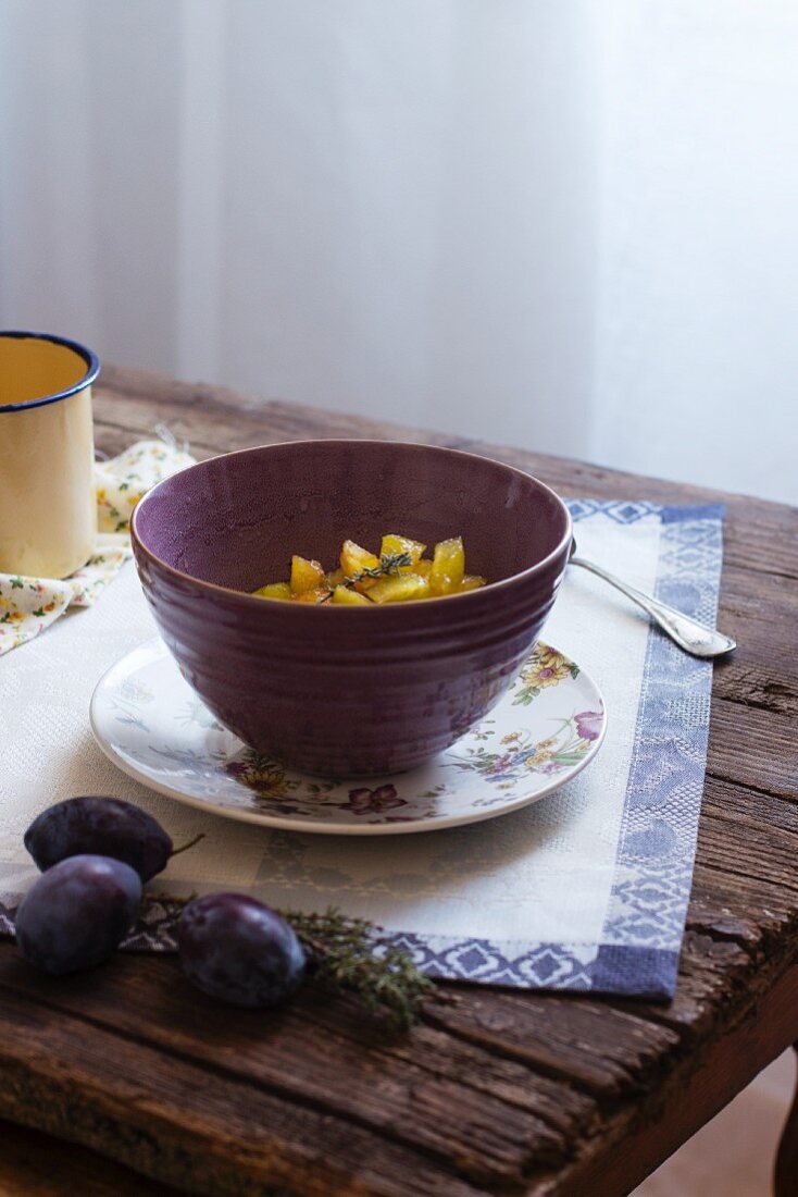 Plum salad in a ceramic bowl