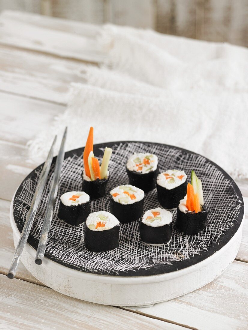 Vegan sushi with macadamia cream cheese, carrots and cucumber