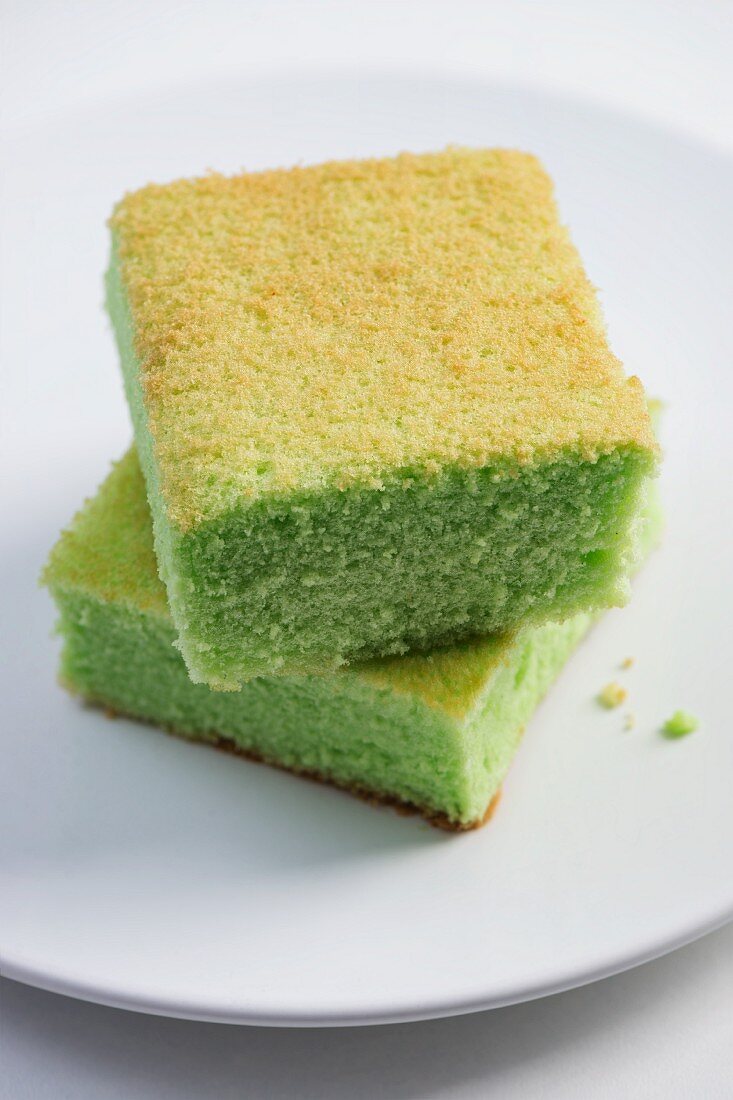 Two slices of Singaporean pandan chiffon cake