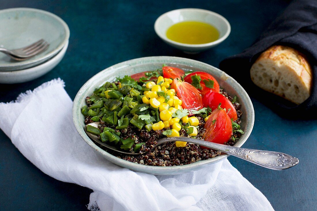 Roasted Poblano Quinoa topped with Corn, Tomatoes and Cilantro, served with Olive Oil and Bread