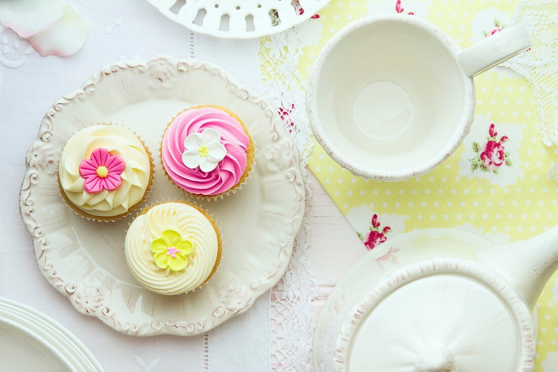 Tea and cupcakes, overhead view