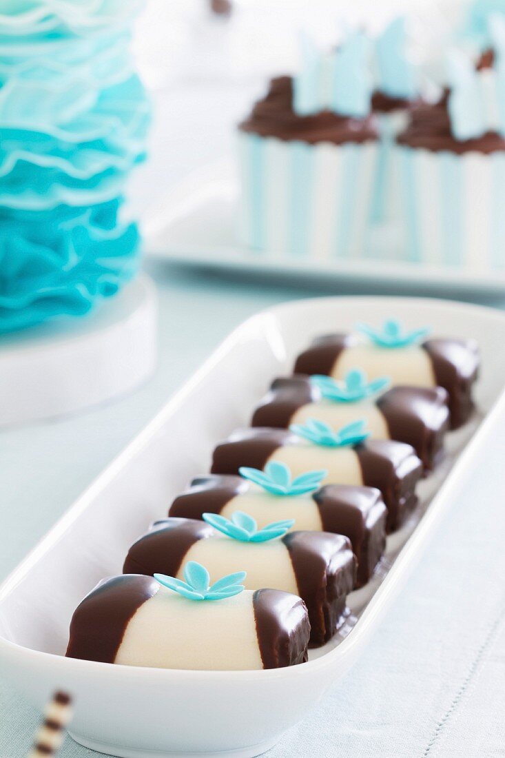 Cakes arranged on a dessert table