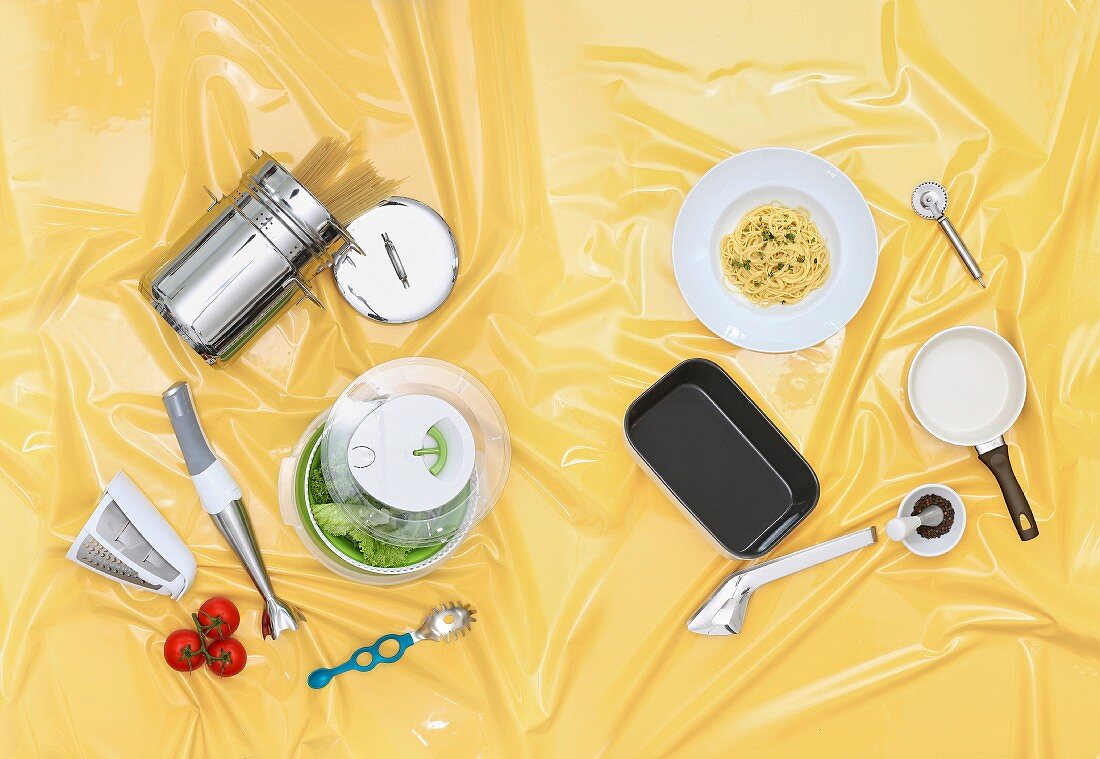 Assorted kitchen utensils for preparing pasta dishes
