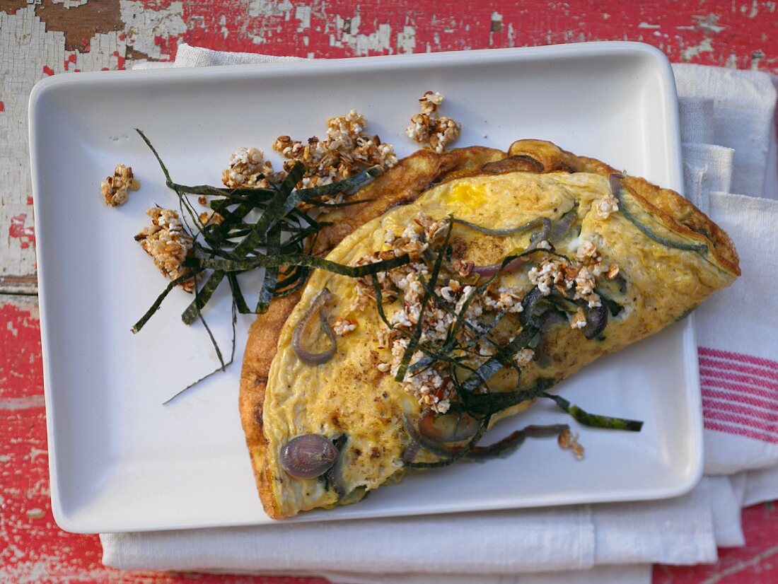 Onion omelette with crispy chilli flakes and nori seaweed