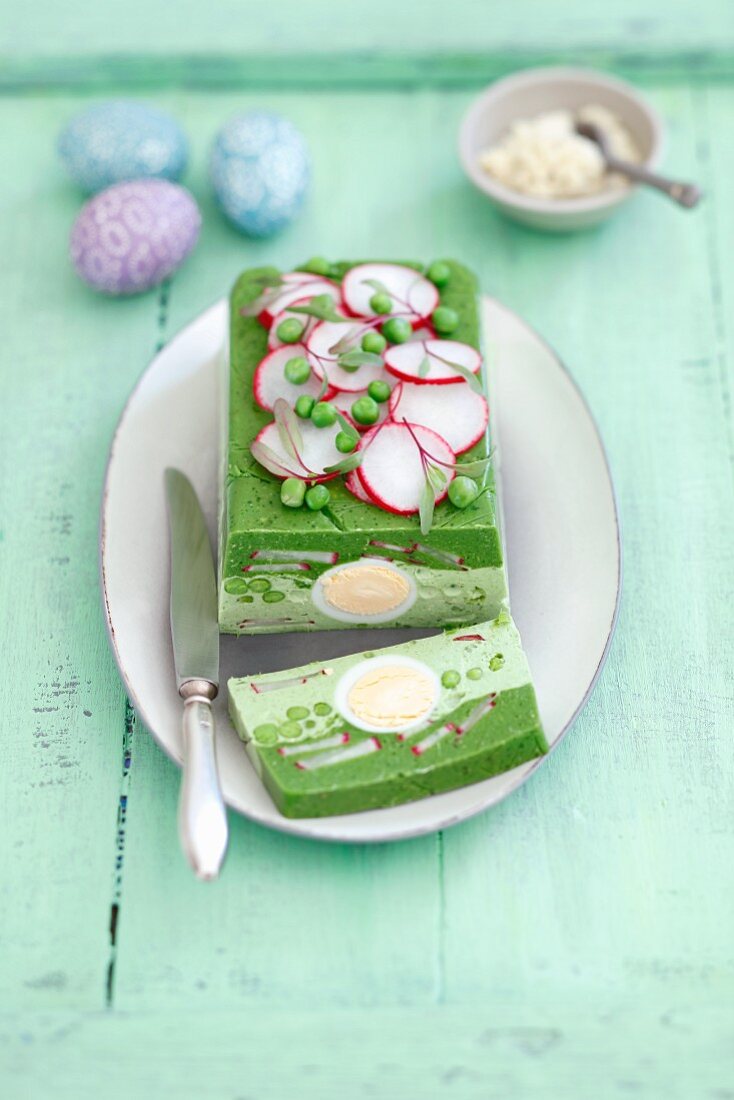 Spinach and pea terrine with eggs and radishes for Easter