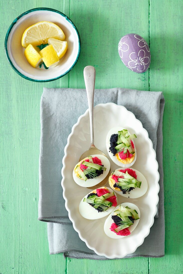 Eggs with caviar and cucumber for Easter
