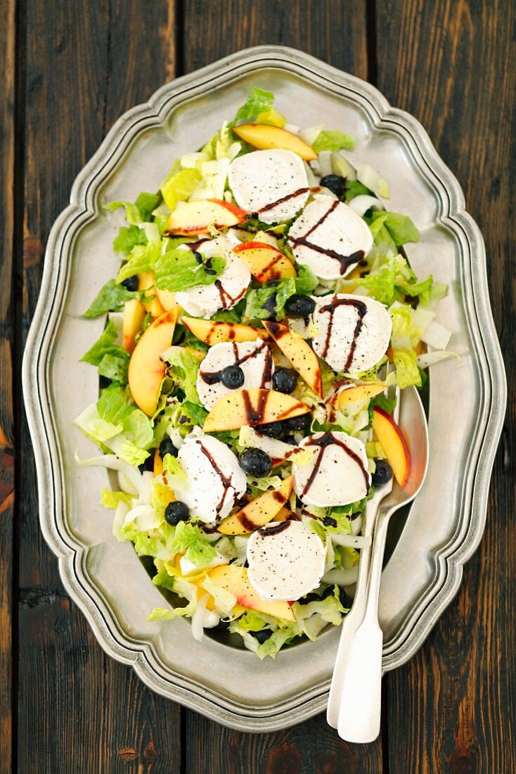 Chicory and cos lettuce salad with nectarines, blueberries and goats' cheese