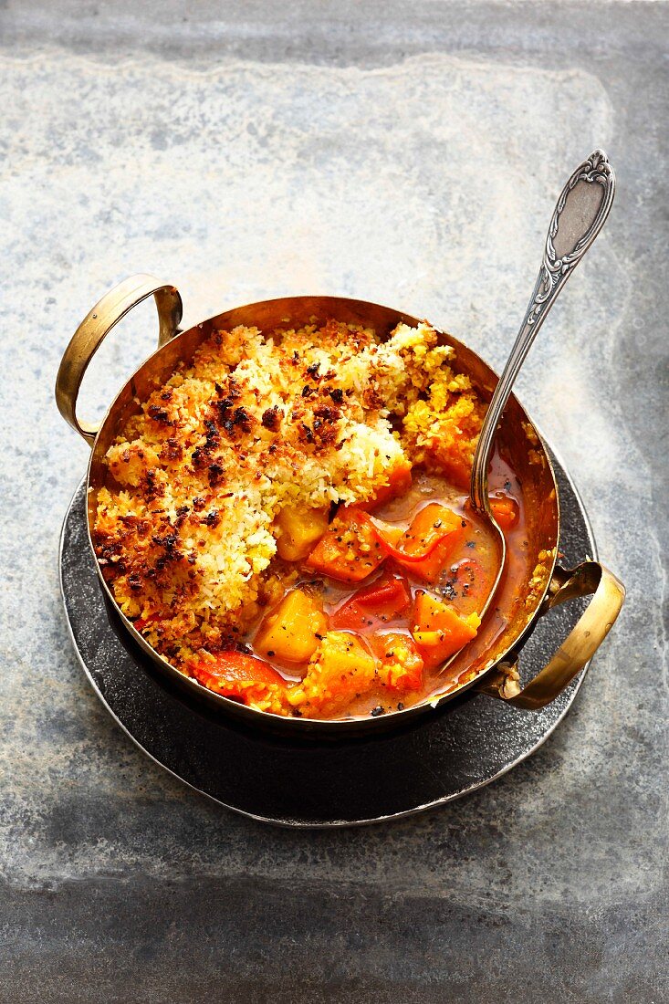 Asian sweet potato curry with pineapple, tomato and a coconut crust