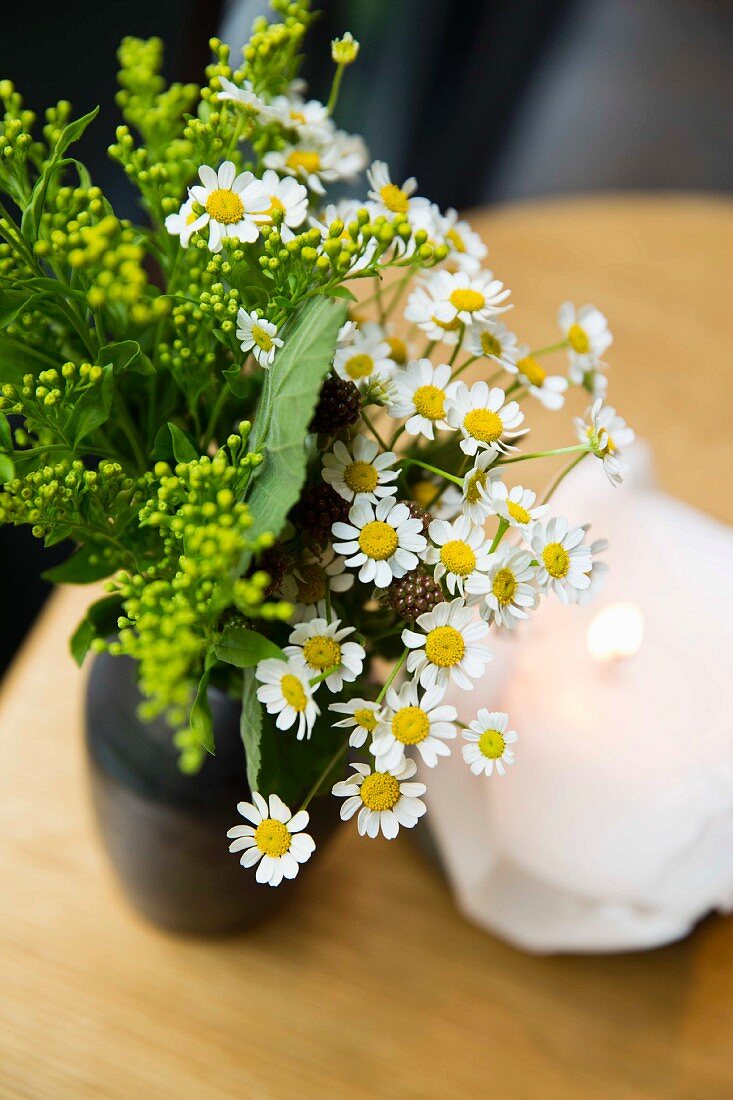 Daisies as a table decoration at the Kadeau restaurant in Copenhagen, Denmark