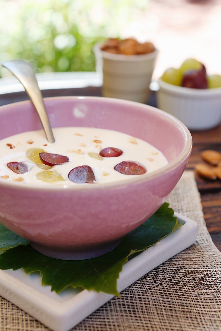 White gazpacho with coconut, grapes and almonds