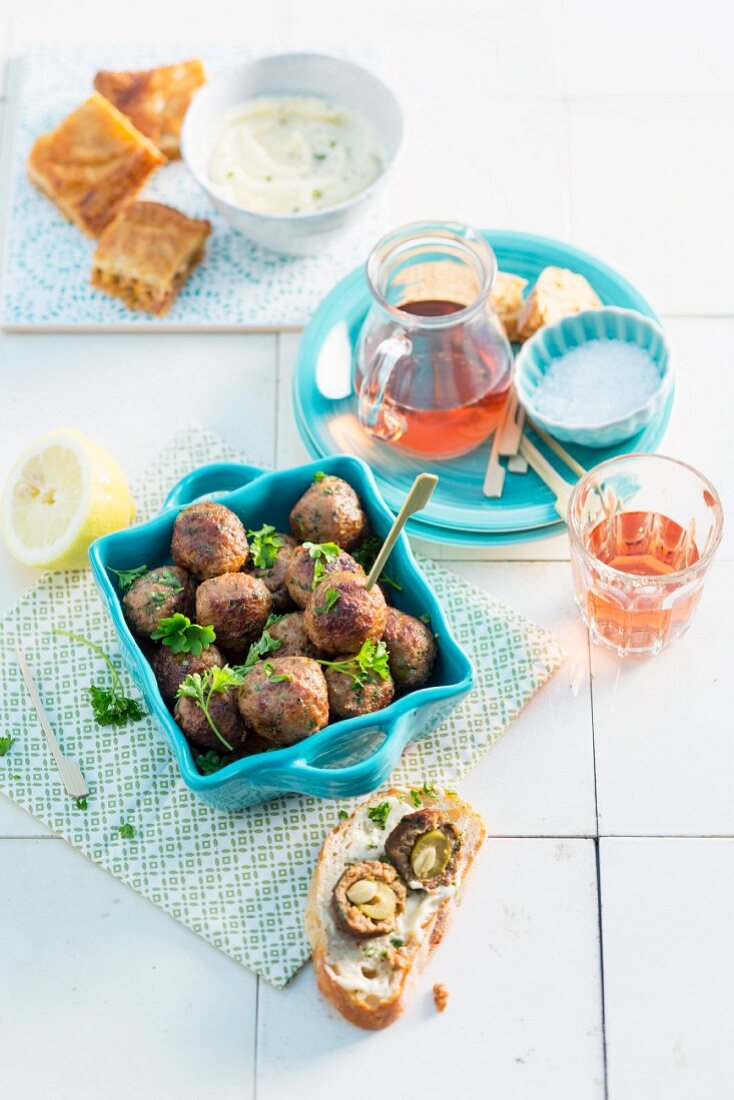 Meatballs stuffed with almonds and olives