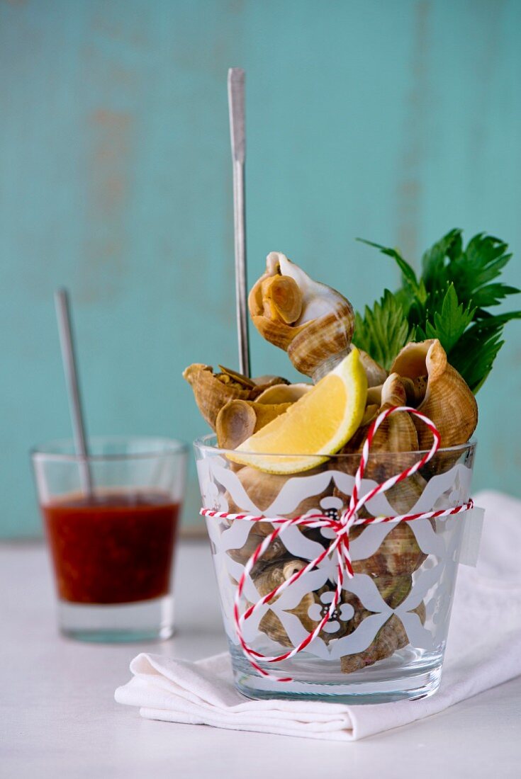 Whelks in a glass with lemon, parsley and New England seafood salsa