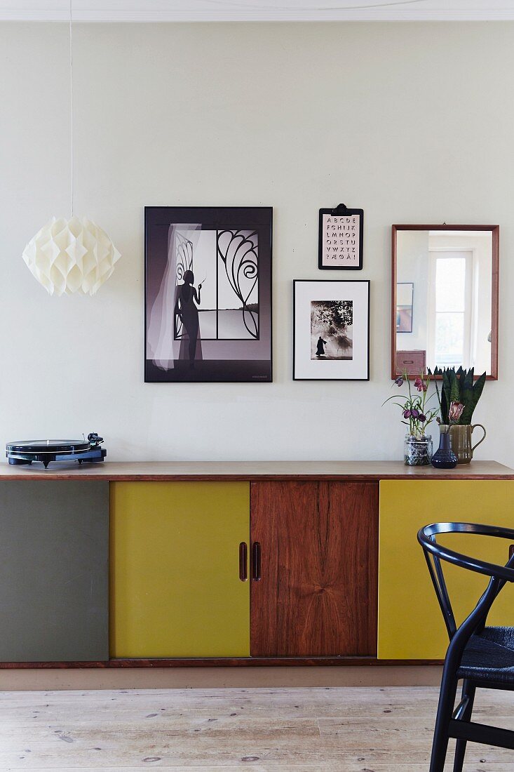 Pictures above retro sideboard with door in various colours