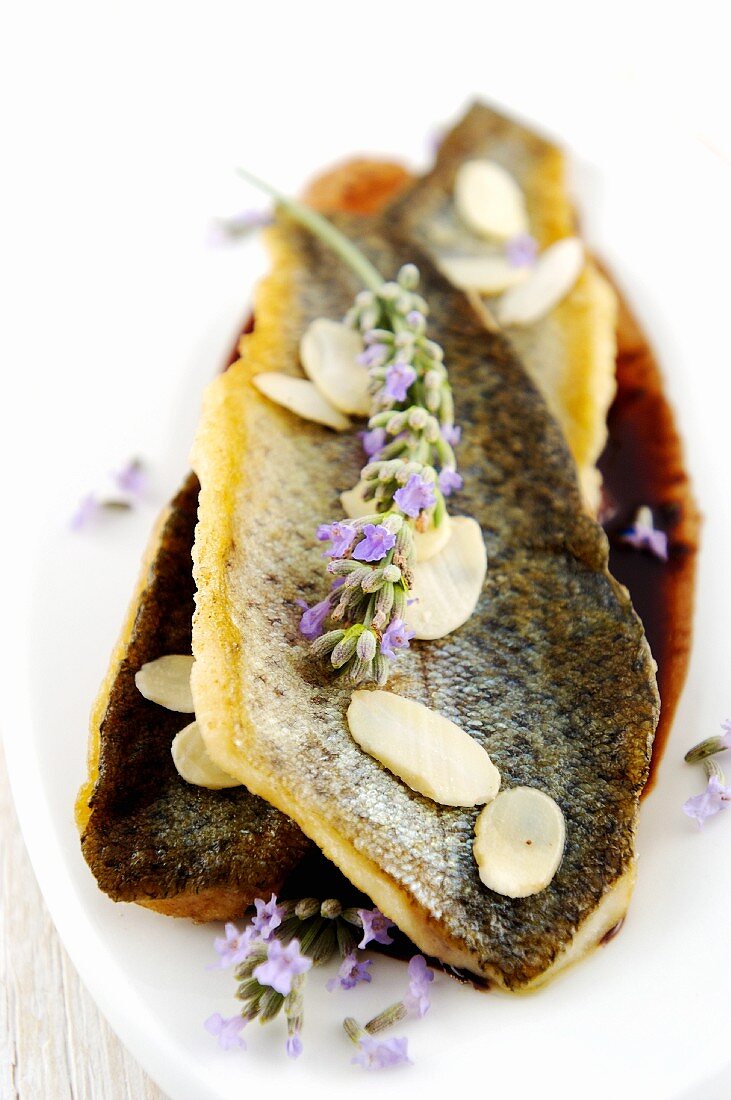 Trout in sauce with almonds and lavender