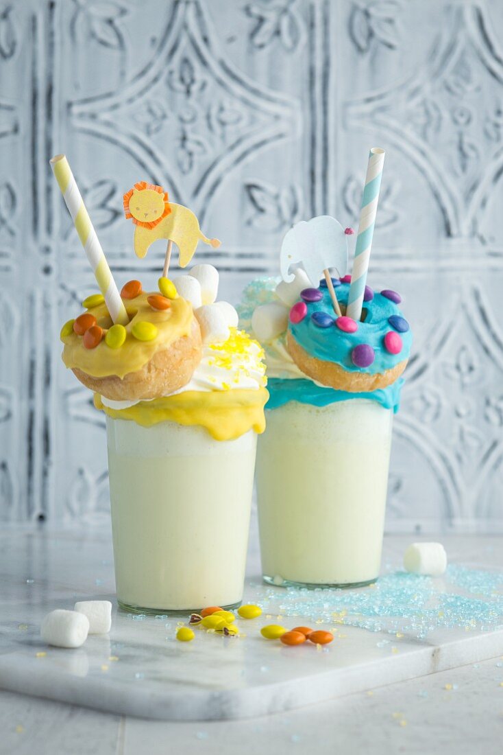 Banana freak shakes with colourful mini doughnuts for a children's party