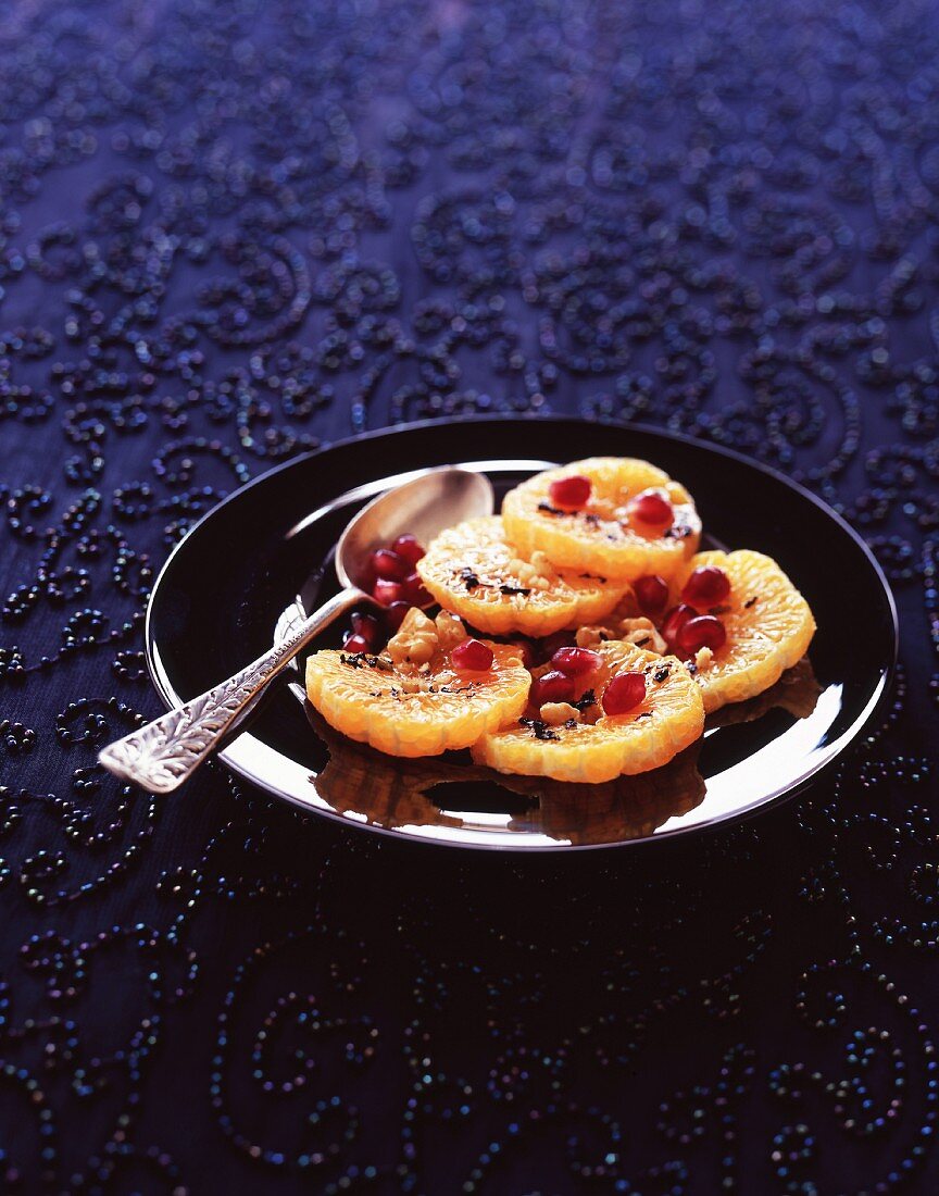 Candied orange slices with pomegranate seeds